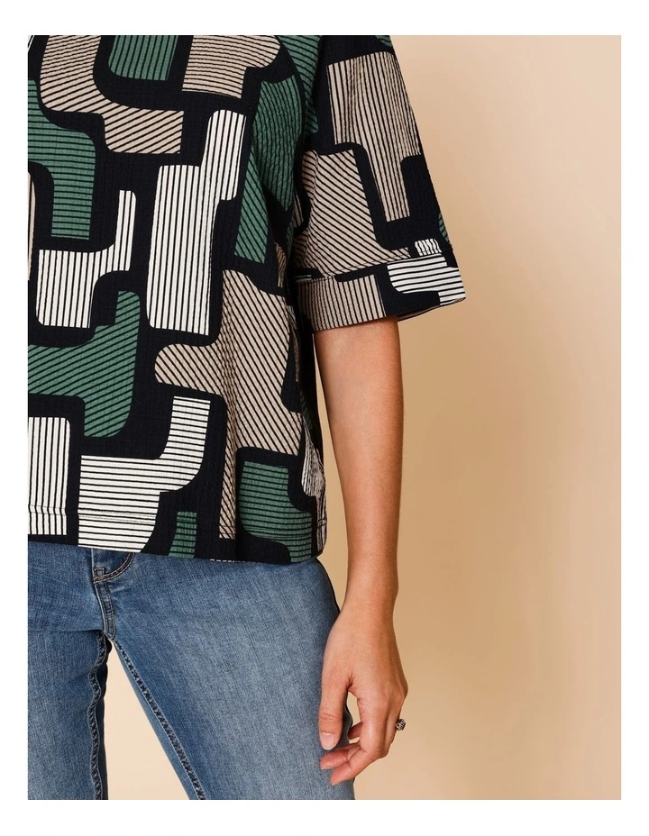 Raglan Short Sleeve Woven Front Tee With Knit Back In Green/Black/Neutral Geo Print image 4