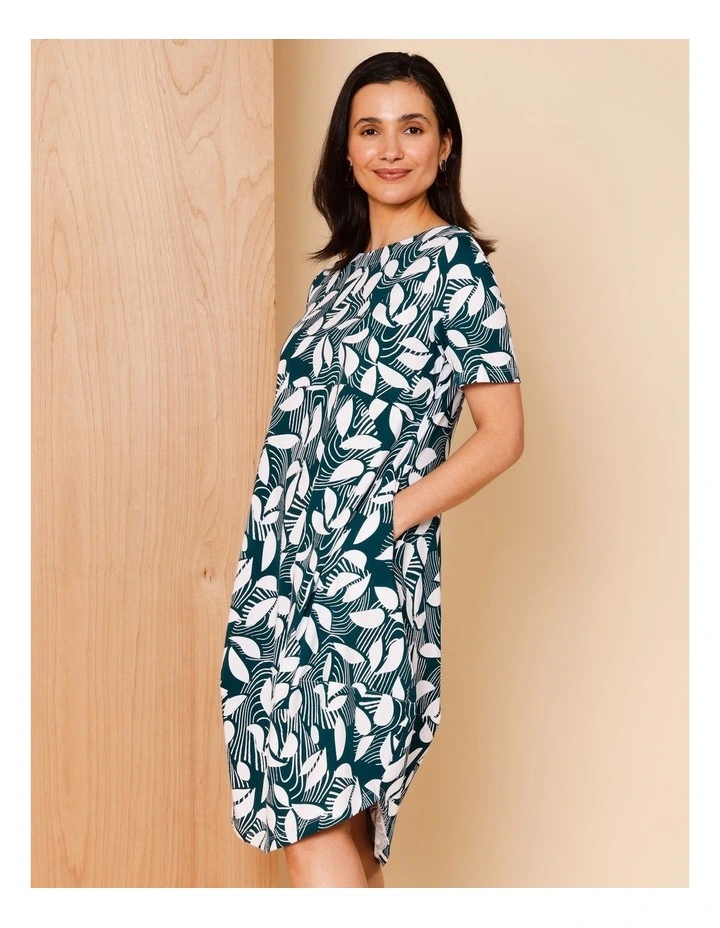 Short Sleeve Knit Dress With Darted Hem And Pockets In Teal/White Abstract Print image 2