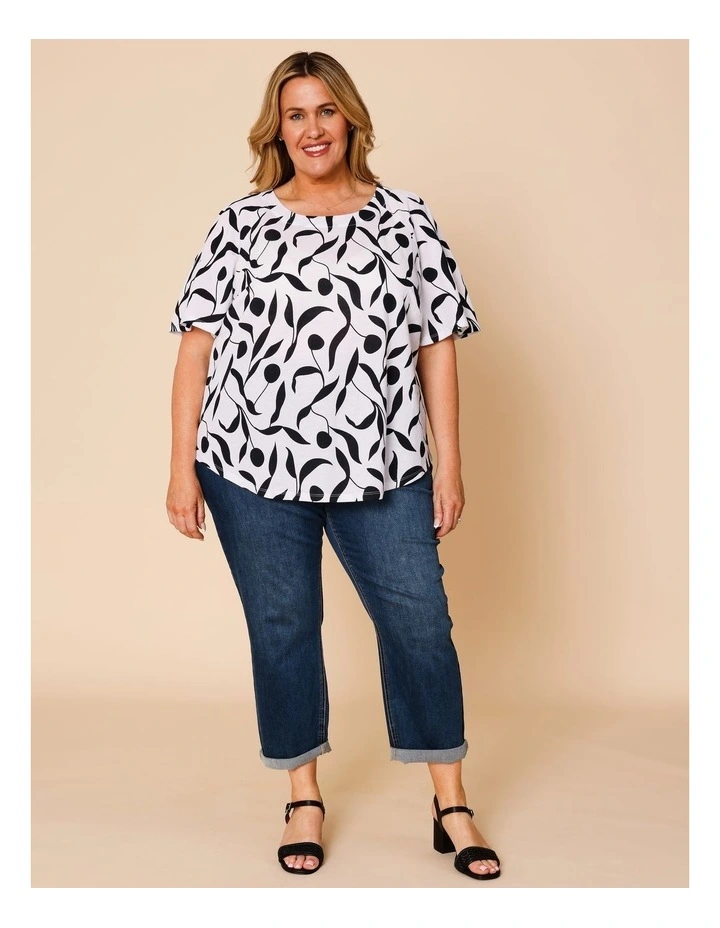 Short Raglan Sleeve Tee With Curved Hem In White With Black Leaf Print image 2