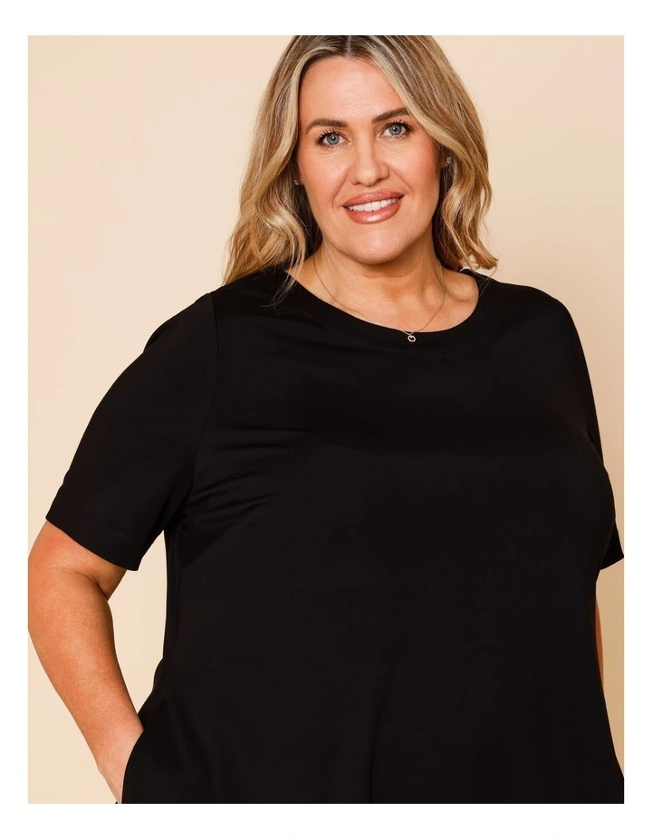 Short Sleeve Knit Dress With Darted Hem And Pockets In Black image 5
