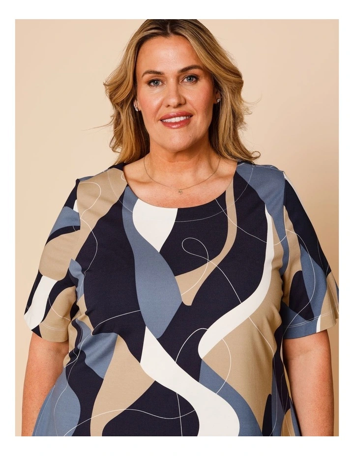 Short Sleeve Knit Dress With Darted Hem And Pockets In Blues Print image 3