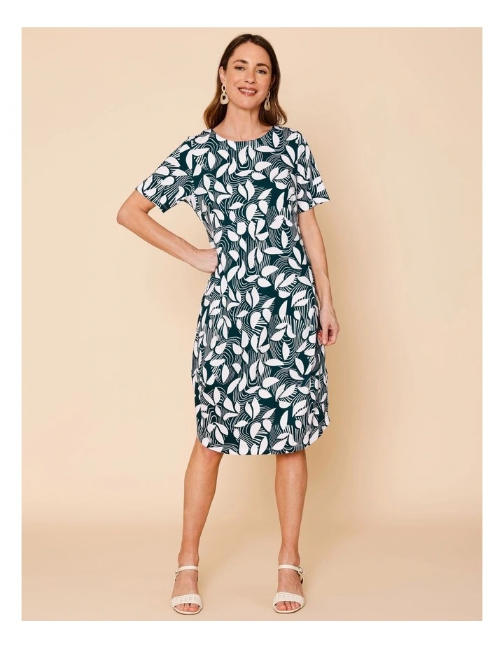 Short Sleeve Knit Dress With Darted Hem And Pockets In Teal/White Abstract Print image 1