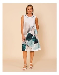 Sleeveless Dress With Piped Neck And Pockets In White With Green Abstract Border Print