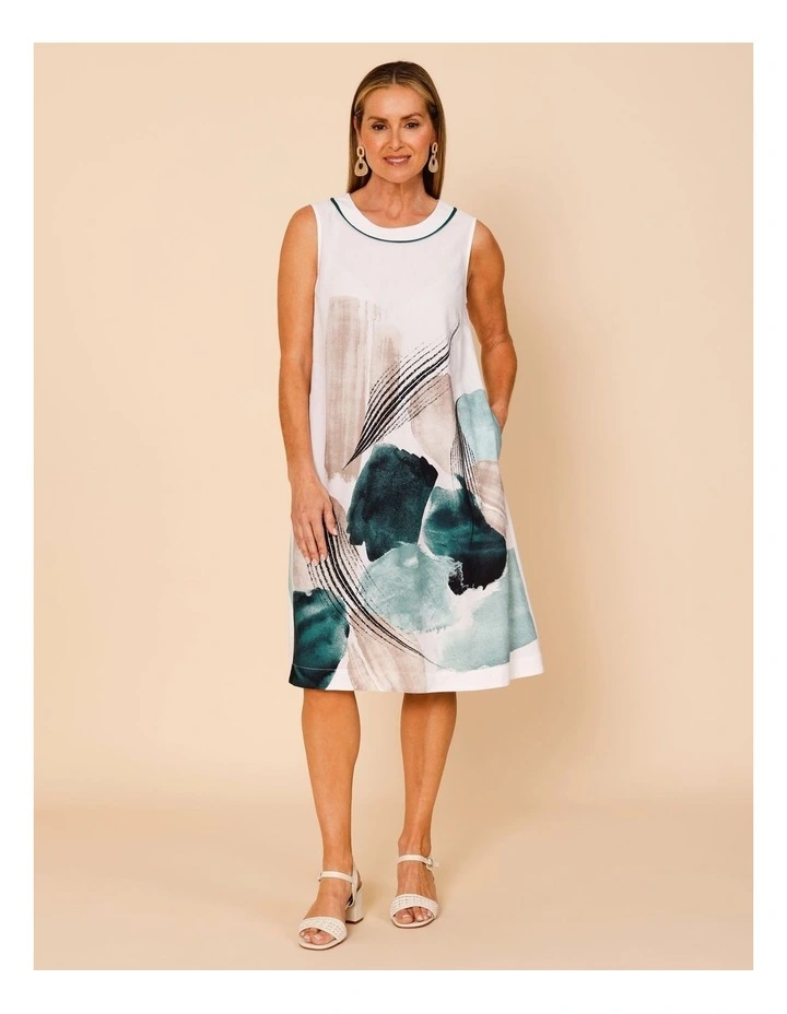 Sleeveless Dress With Piped Neck And Pockets In White With Green Abstract Border Print image 1