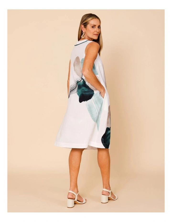 Sleeveless Dress With Piped Neck And Pockets In White With Green Abstract Border Print image 2