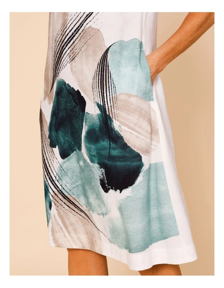 Sleeveless Dress With Piped Neck And Pockets In White With Green Abstract Border Print image 3