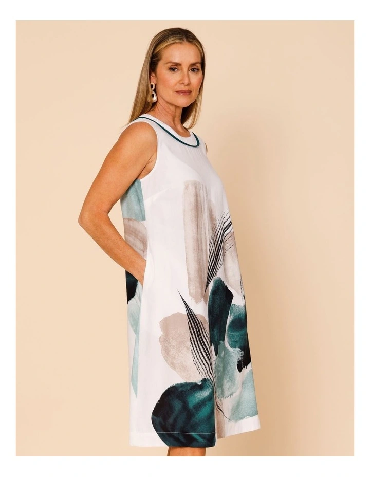 Sleeveless Dress With Piped Neck And Pockets In White With Green Abstract Border Print image 4