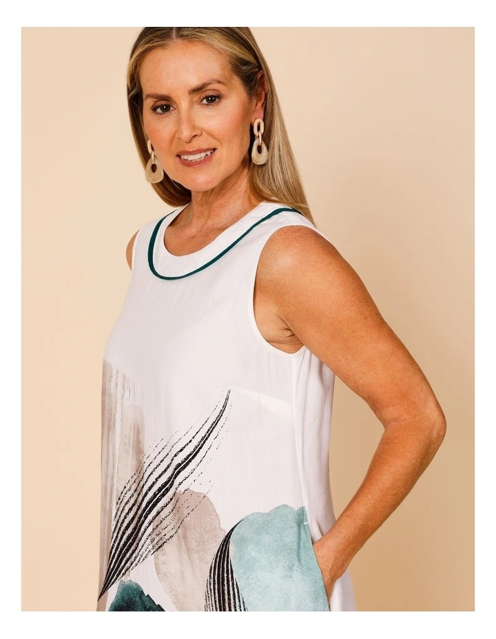 Sleeveless Dress With Piped Neck And Pockets In White With Green Abstract Border Print image 5