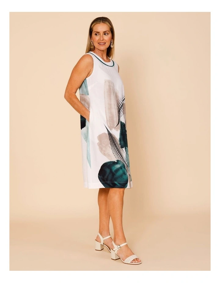 Sleeveless Dress With Piped Neck And Pockets In White With Green Abstract Border Print image 6