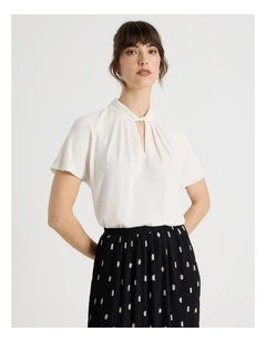 Short Sleeve Tuck V Neck Top in Cloud Dancer