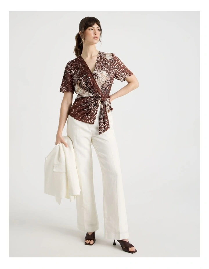 Short Sleeve Wrap Top in Animal Print image 2