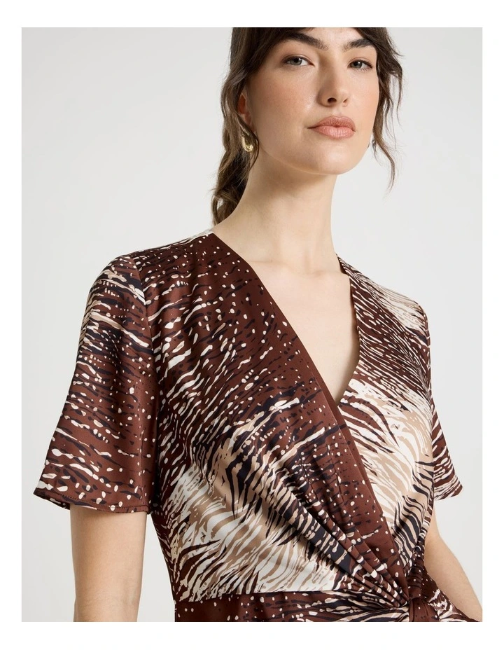 Short Sleeve Wrap Top in Animal Print image 4