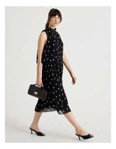 Sleeveless Pleat Midi Dress in Black and White Polka Dot
