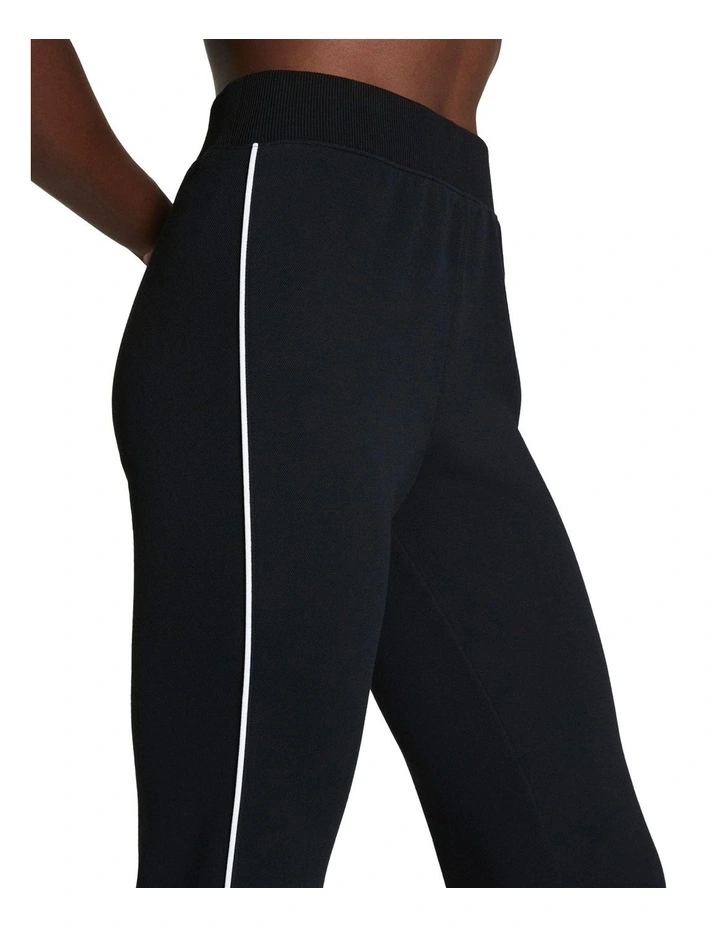 Air Essentials Pique Flare Track Pant in Black image 3