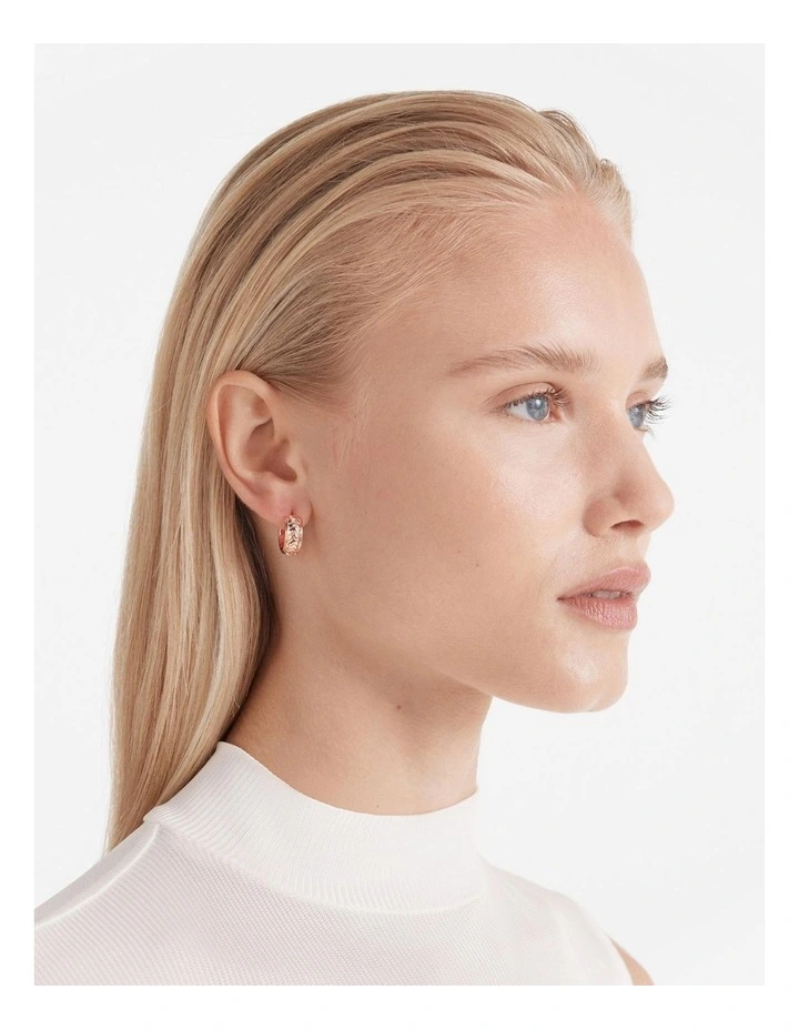 Tracked Huggie Hoop Earrings in Rose Gold image 2