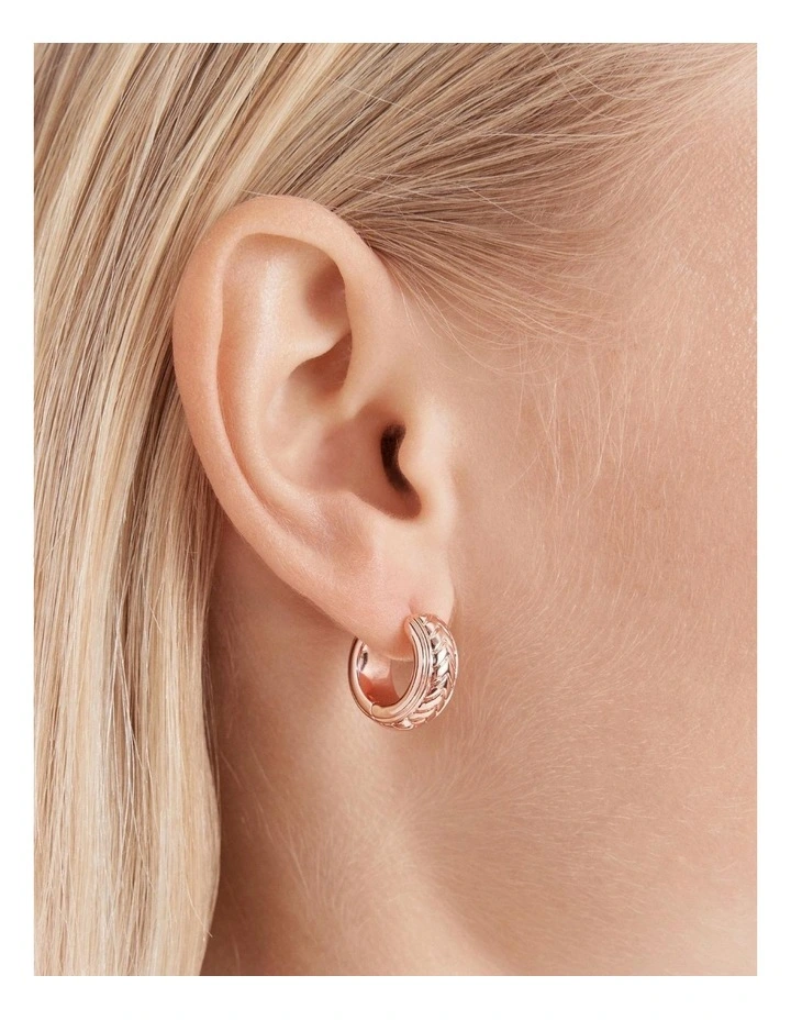 Tracked Huggie Hoop Earrings in Rose Gold image 4