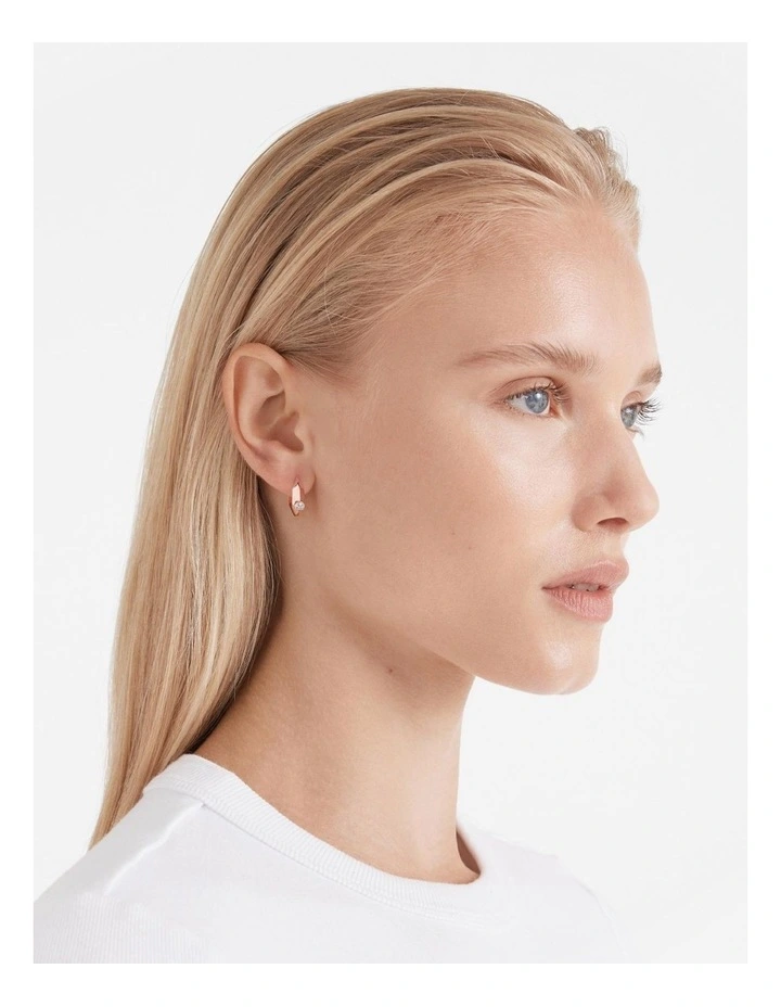 The Edge Huggie Hoop Earrings in Rose Gold image 2