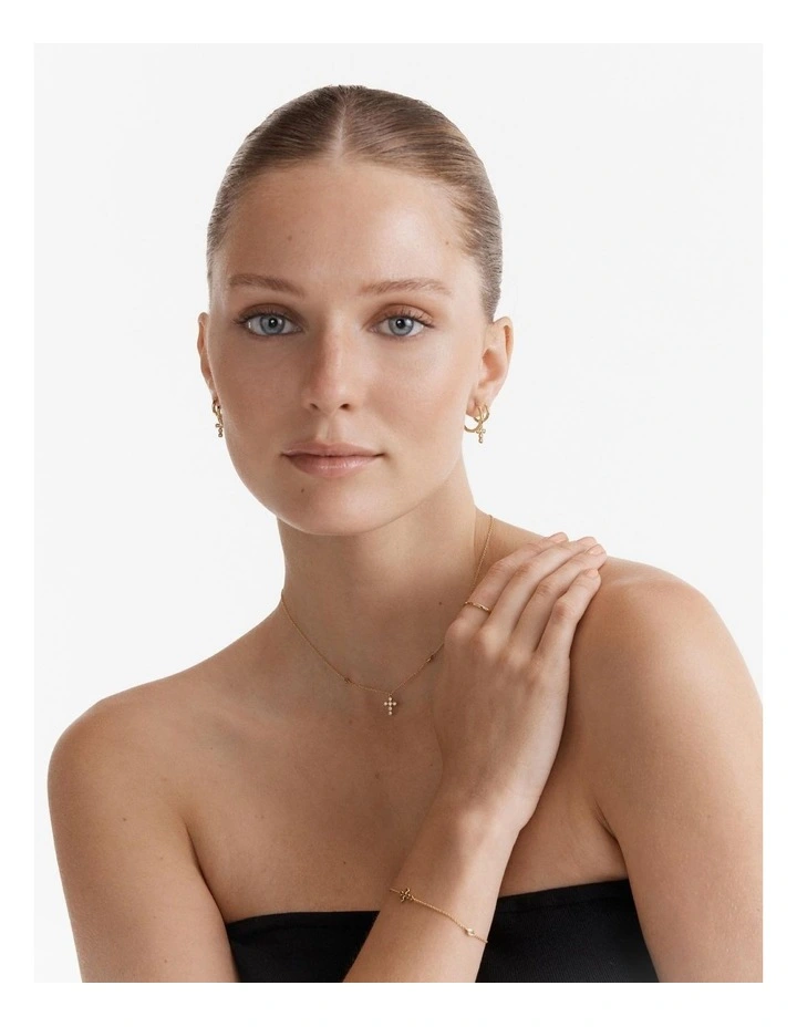 Vela Large Huggie Hoop Earrings in Gold image 5