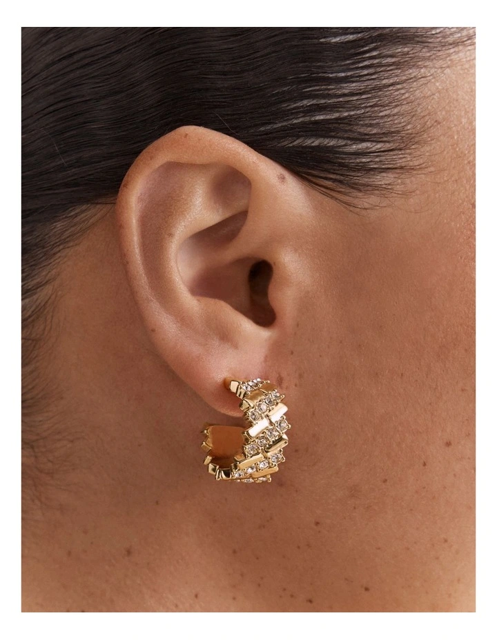 Winked Huggie Hoop Earrings in Gold image 2