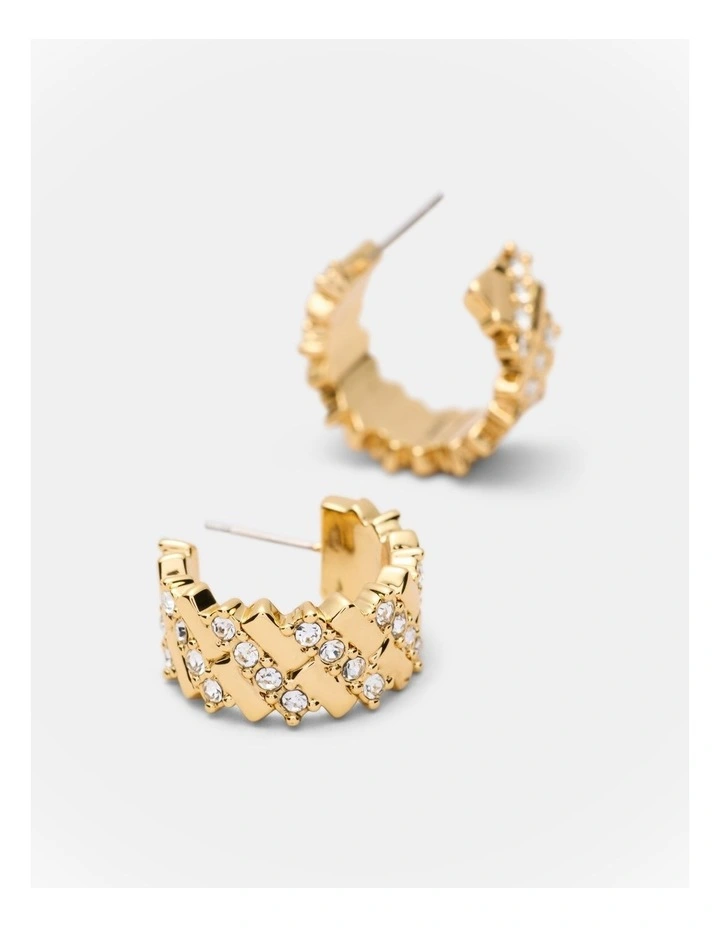 Winked Huggie Hoop Earrings in Gold image 3