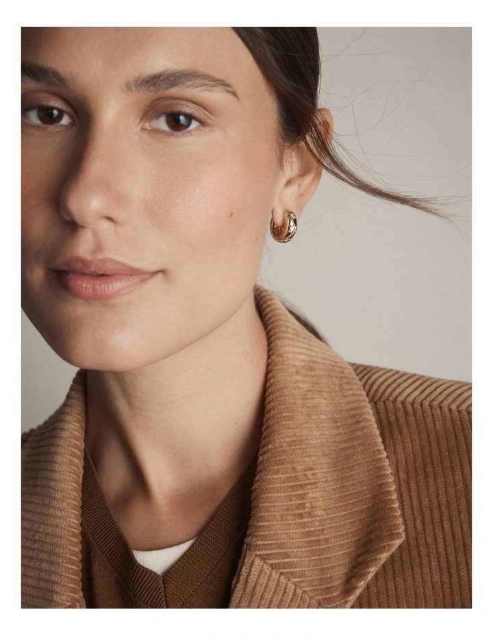 Westlyn Huggie Earrings in Gold image 4