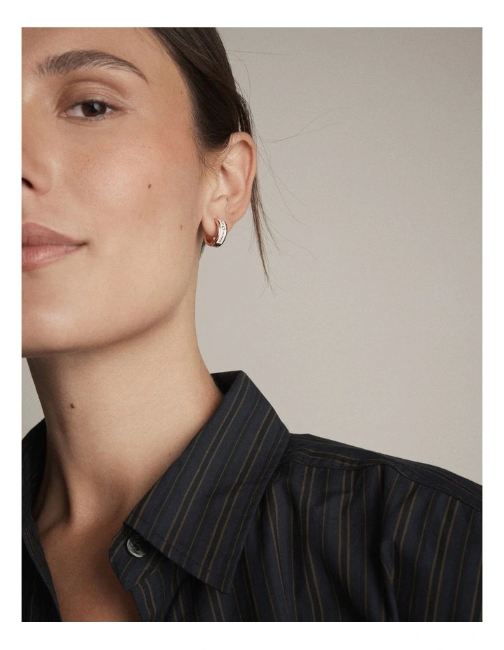 Enamour Huggie Earrings in Vanilla image 4