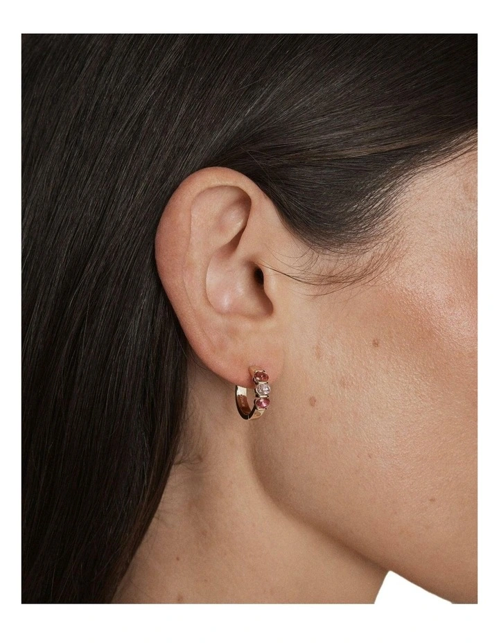 Kaleidos Huggie Earrings Ear in Fuchsia image 4