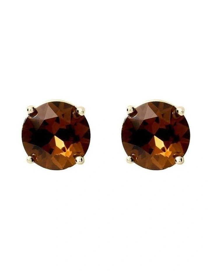 Glowy Crystal Stud Earrings Ear in Chocolate image 1
