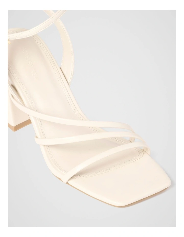Beth Block Heels Asymmetrical Sandals in Cream image 3