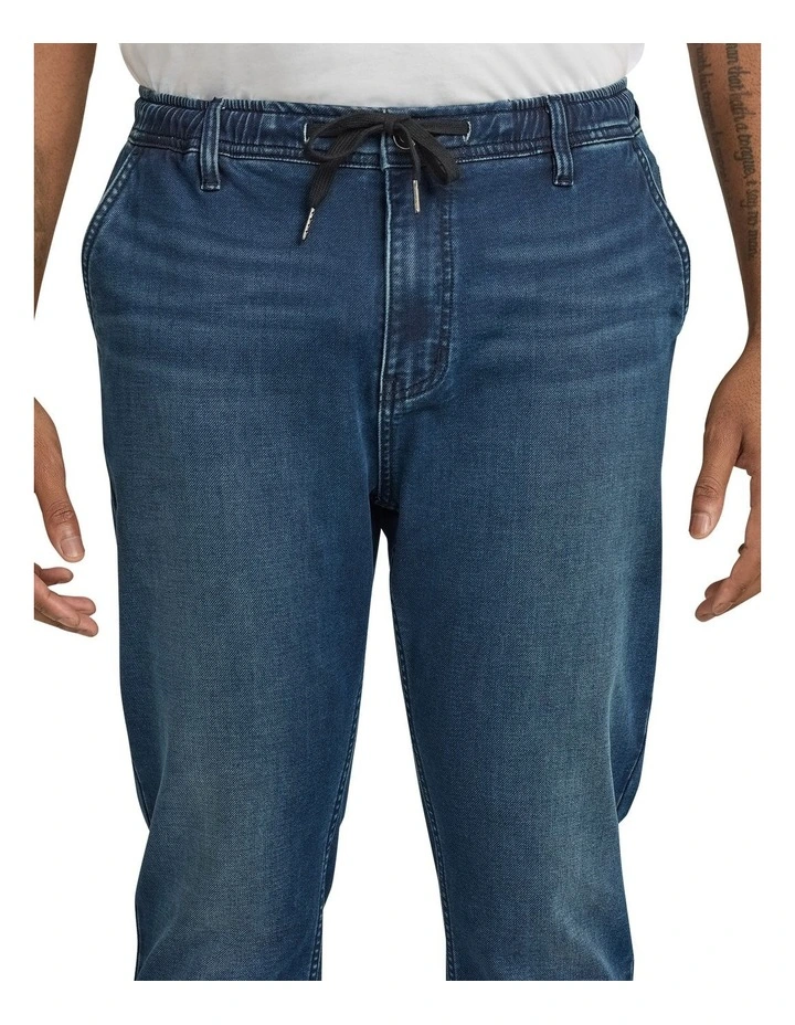 Carl Tapered Knit Denim Jeans in Dark Wash image 3