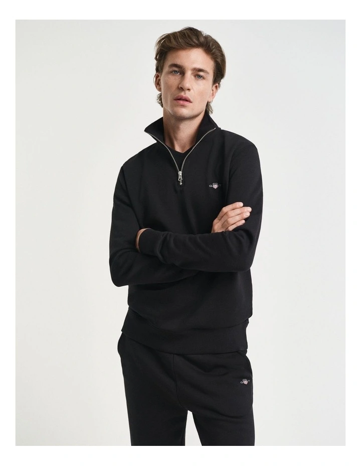 Shield Half Zip Sweater in Black image 1