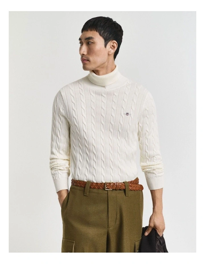 Cotton Cable Knit Turtleneck Sweater in Cream image 1