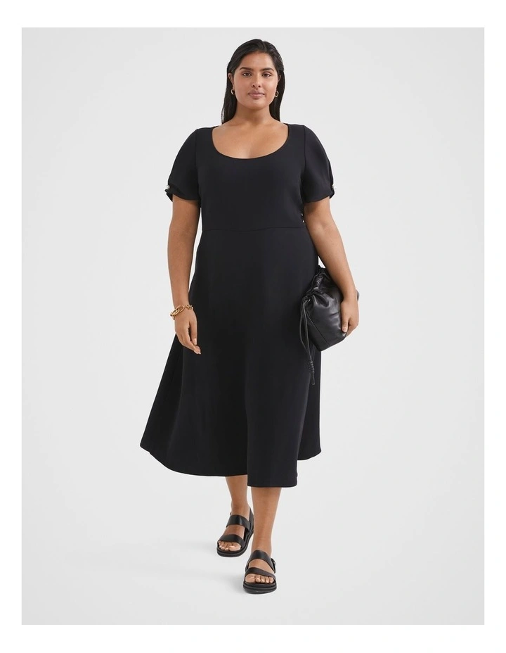 The Stretch Fit And Flare Dress in Black image 1