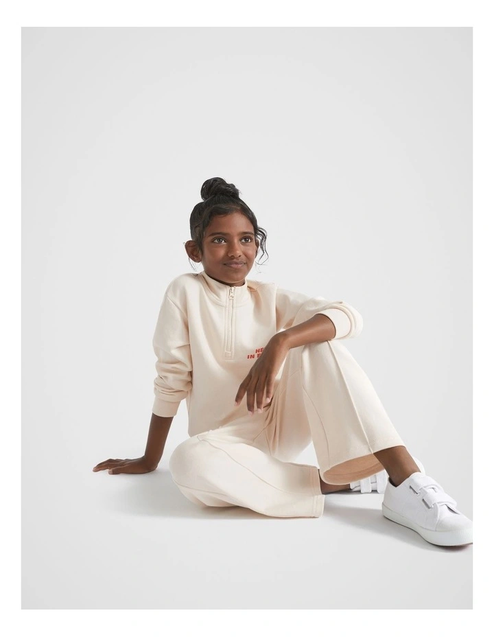 Zip Slogan Sweat Top in Creme image 3
