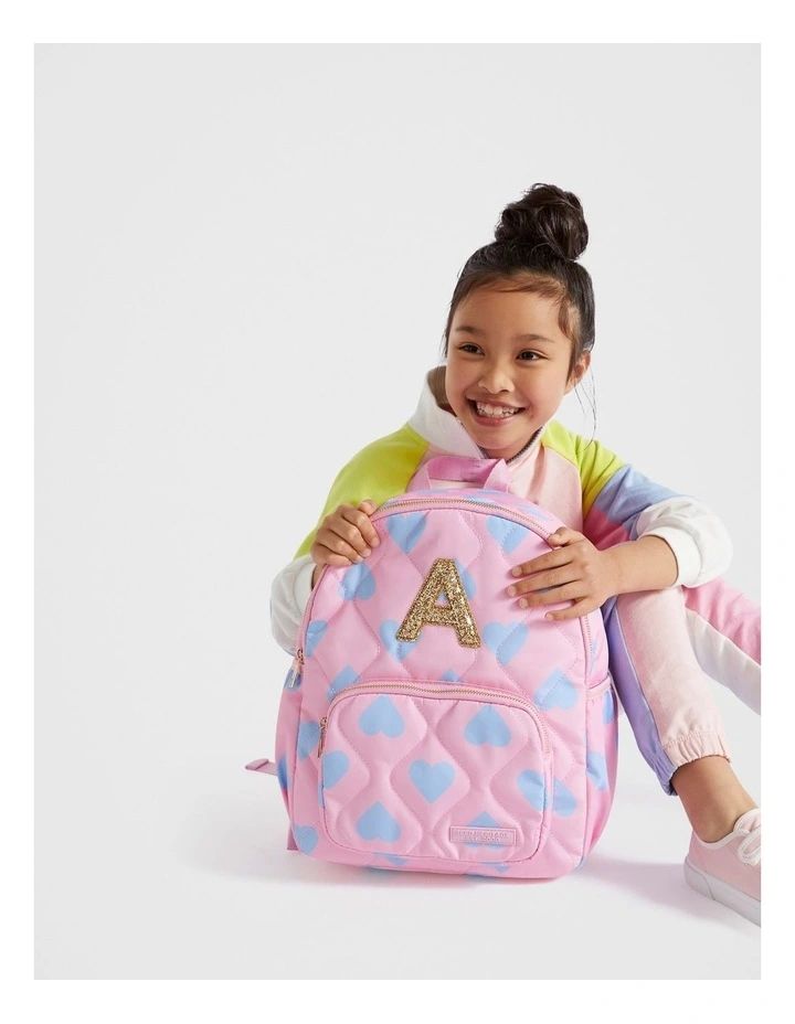 Quilted Initial Backpack in Pink image 2