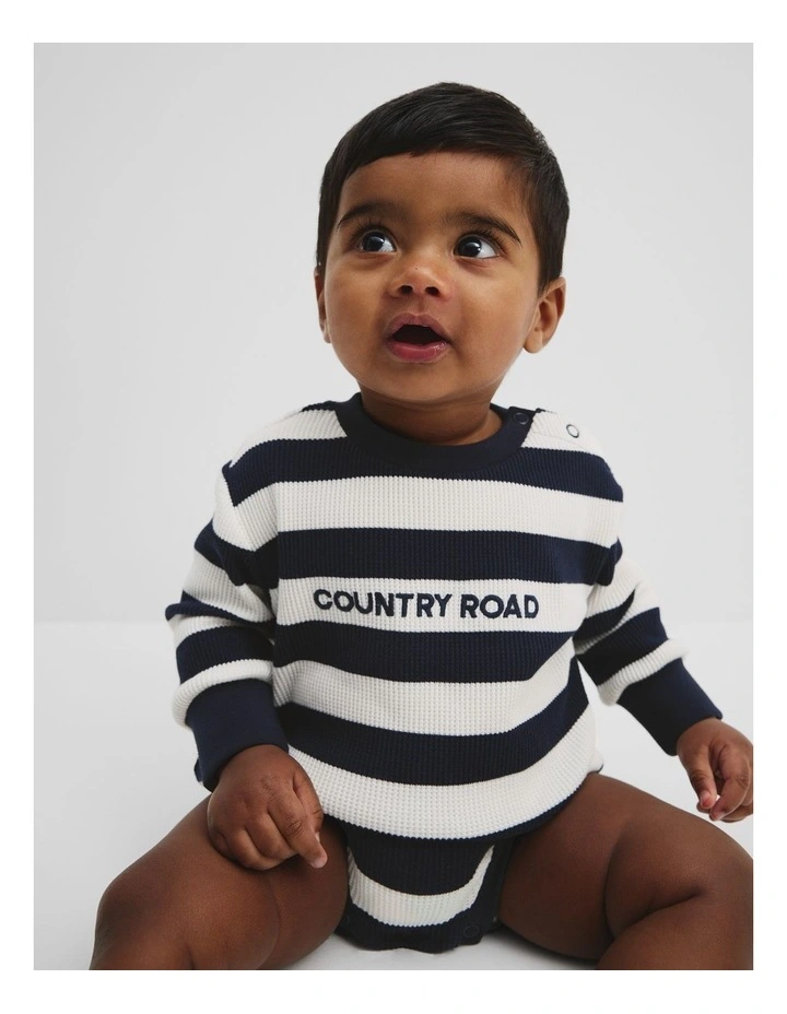 Organically Grown Cotton Waffle Logo Long Sleeve Bodysuit in Navy Stripe image 2