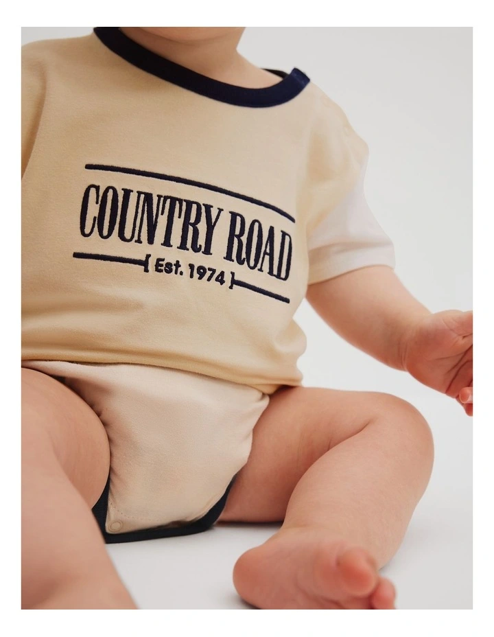 Cotton Spliced Logo Short Sleeve Bodysuit in Shell image 2