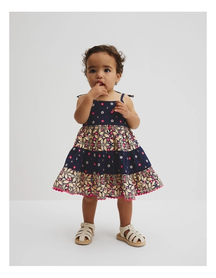 Organically Grown Cotton Tiered Spliced Romper in Navy Floral image 1