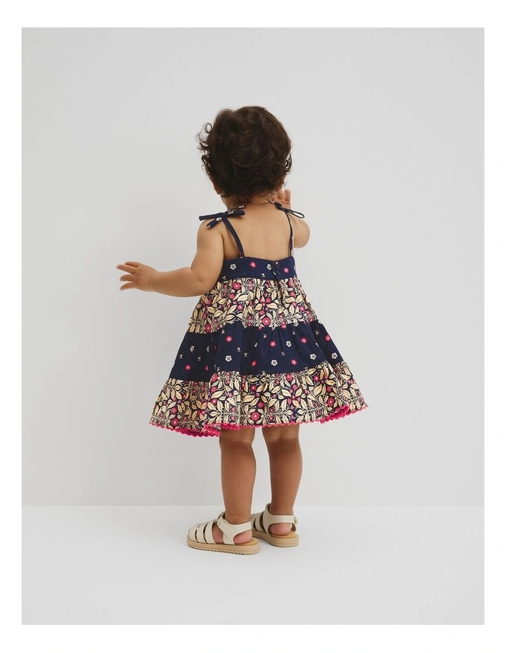 Organically Grown Cotton Tiered Spliced Romper in Navy Floral image 3