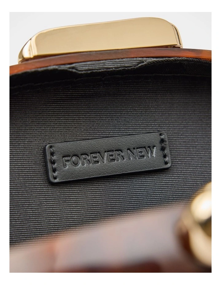 Peyton Oval Hardcase Clutch in Brown image 3
