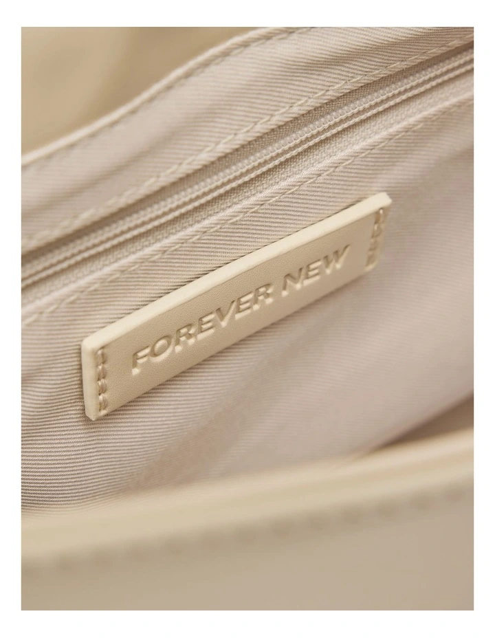 Carly Curve Lock Shoulder Bag in Cream image 3