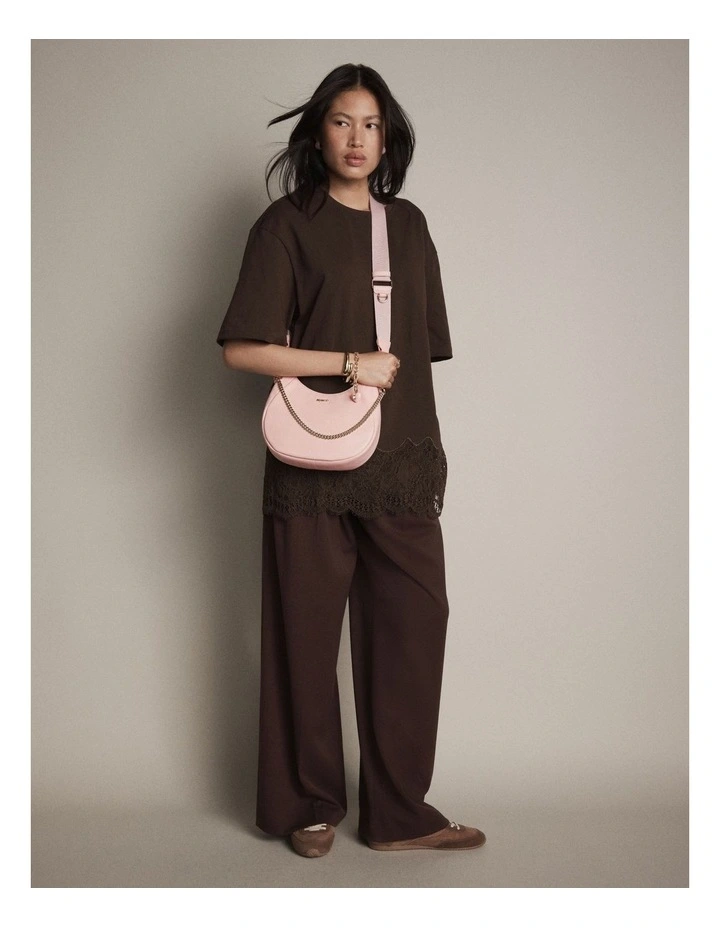 Lily Crescent Crossbody Bag in Petal image 2