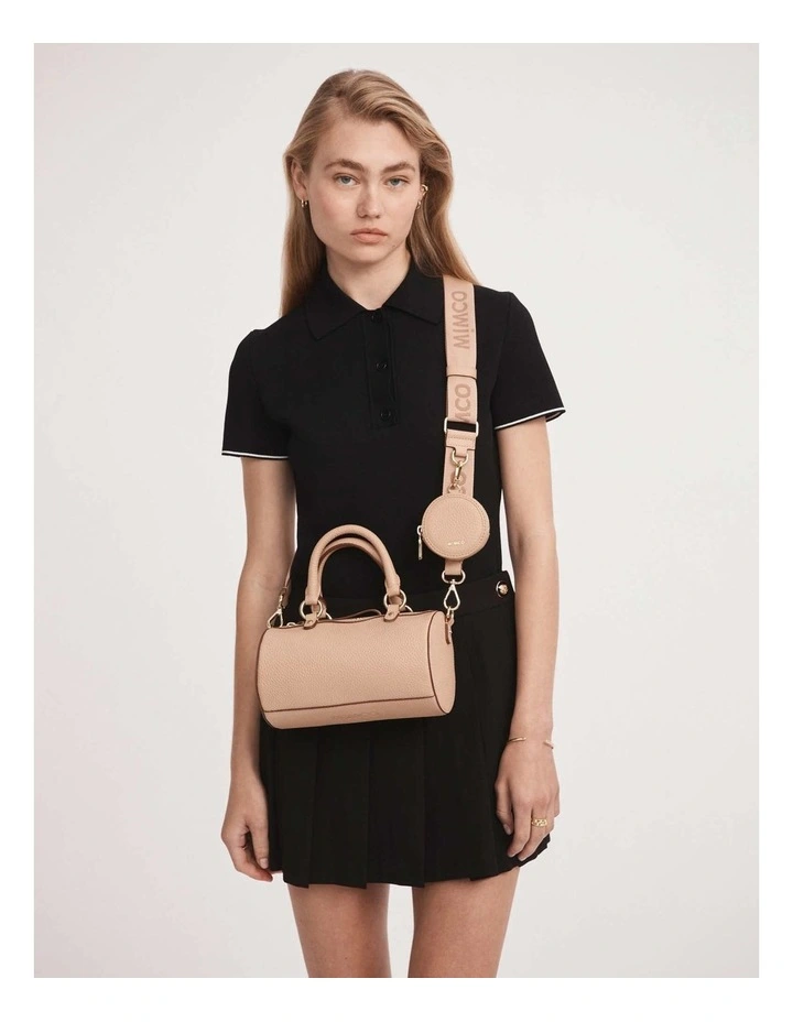 Jett Cylinder Crossbody Bag in Almond image 2