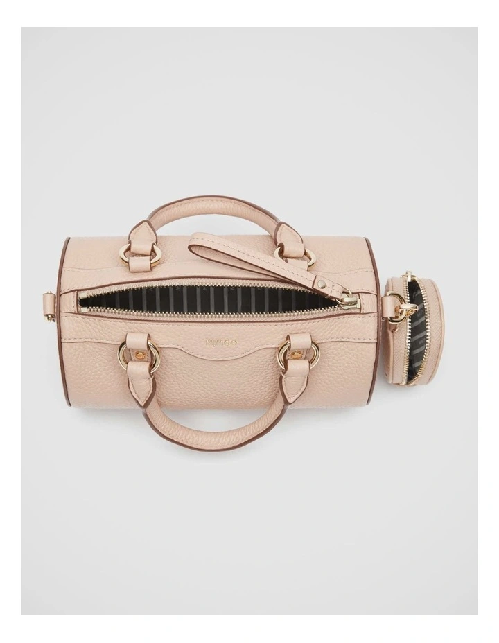 Jett Cylinder Crossbody Bag in Almond image 7