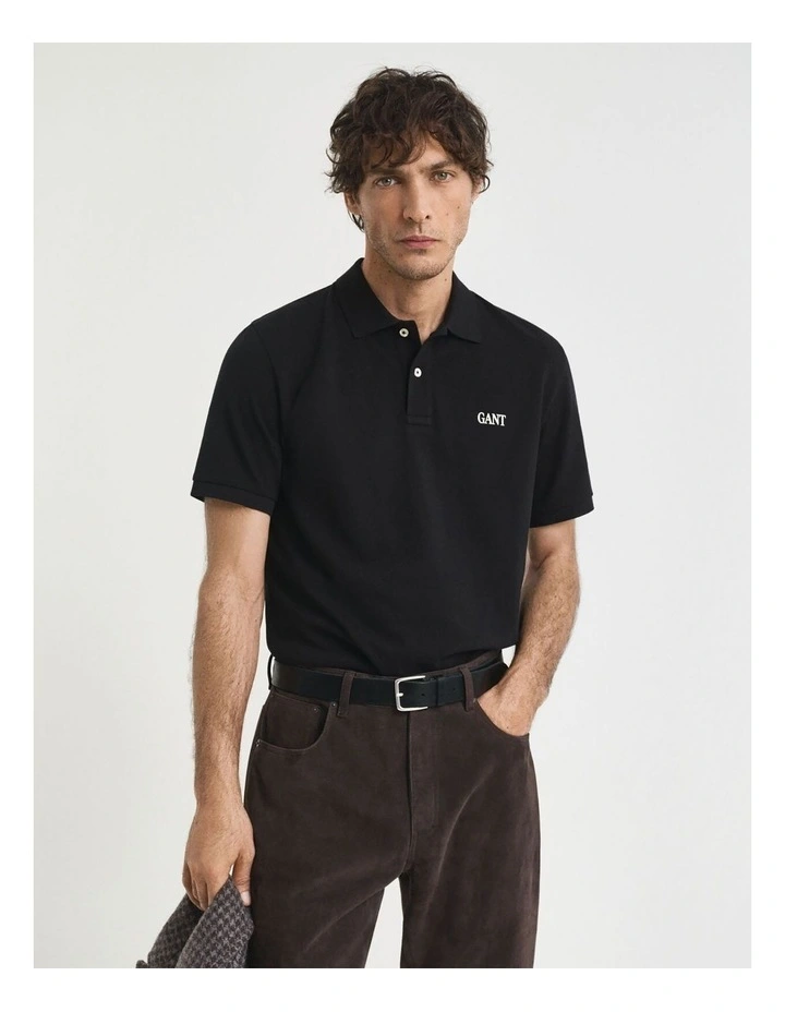 Small Graphic Short Sleeve Polo in Black image 1