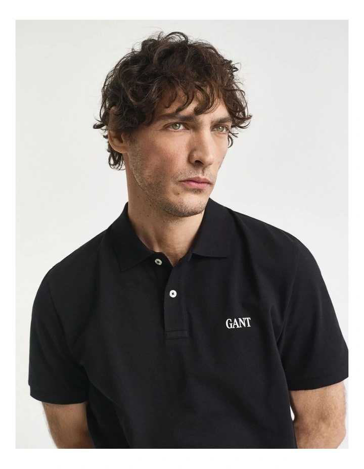 Small Graphic Short Sleeve Polo in Black image 4