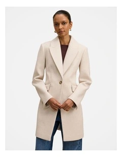 Brianna Coatigan in Cream