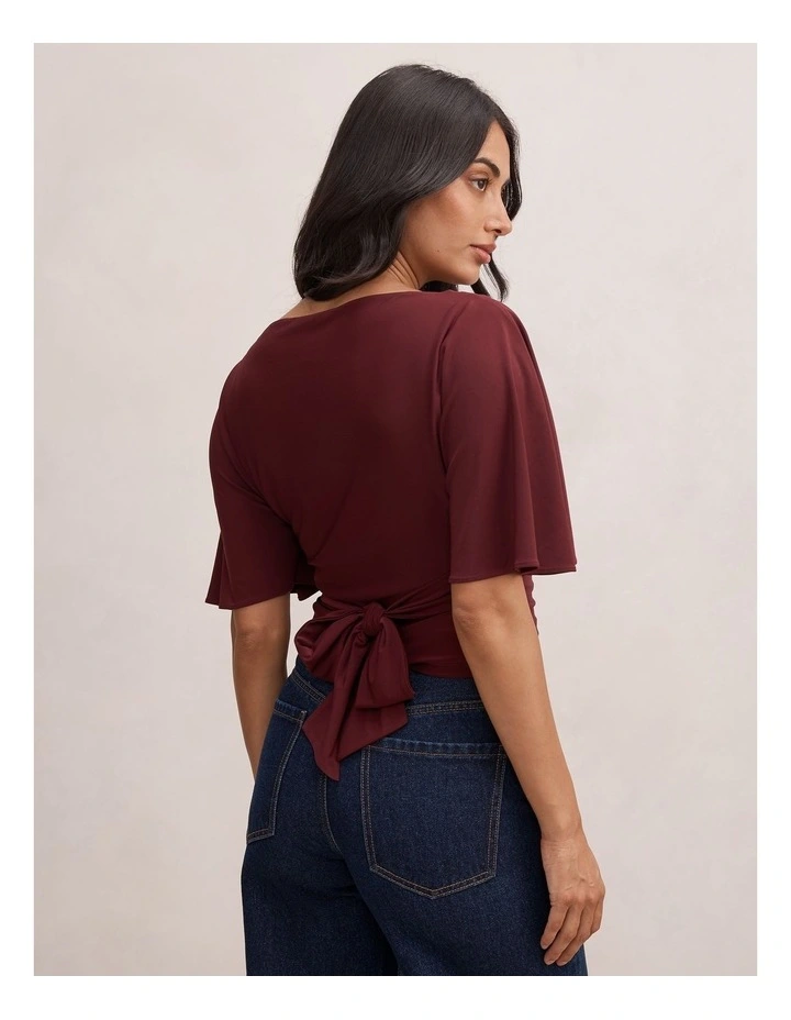 Paige Flutter Sleeves Tie Back Top in Purple image 2
