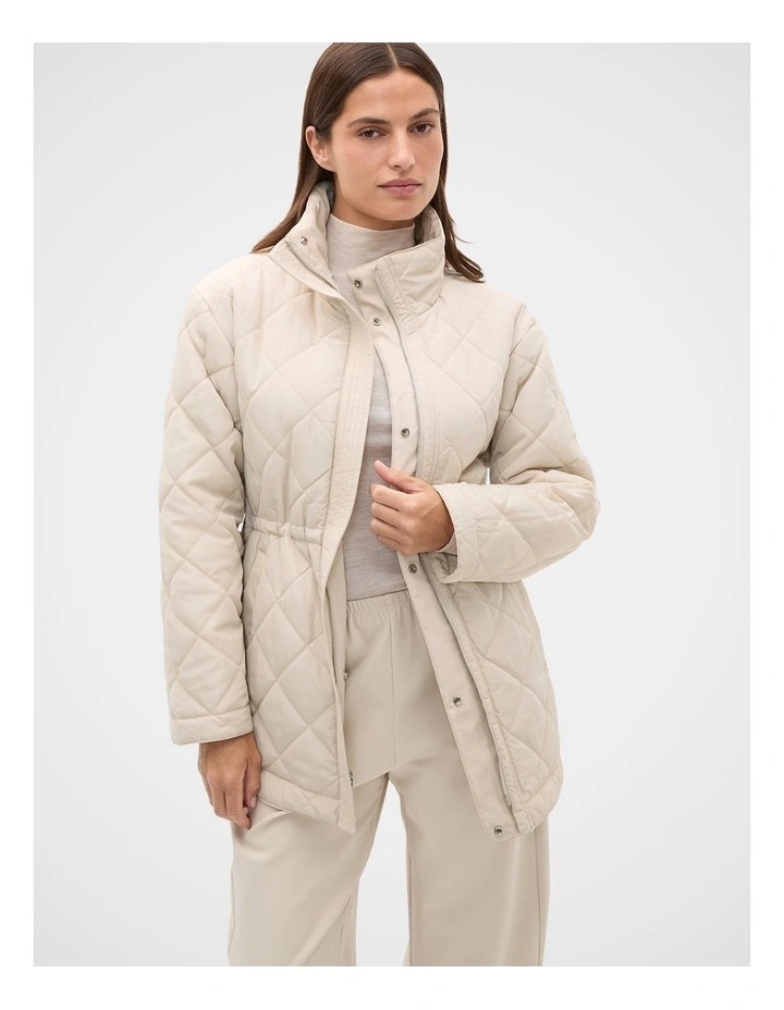 Reversible Puffer Jacket in Vanilla Cream image 5