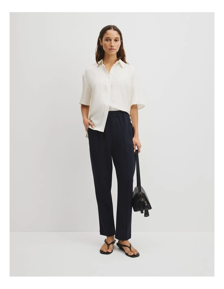 Pleated Tapered Pant in Navy image 1